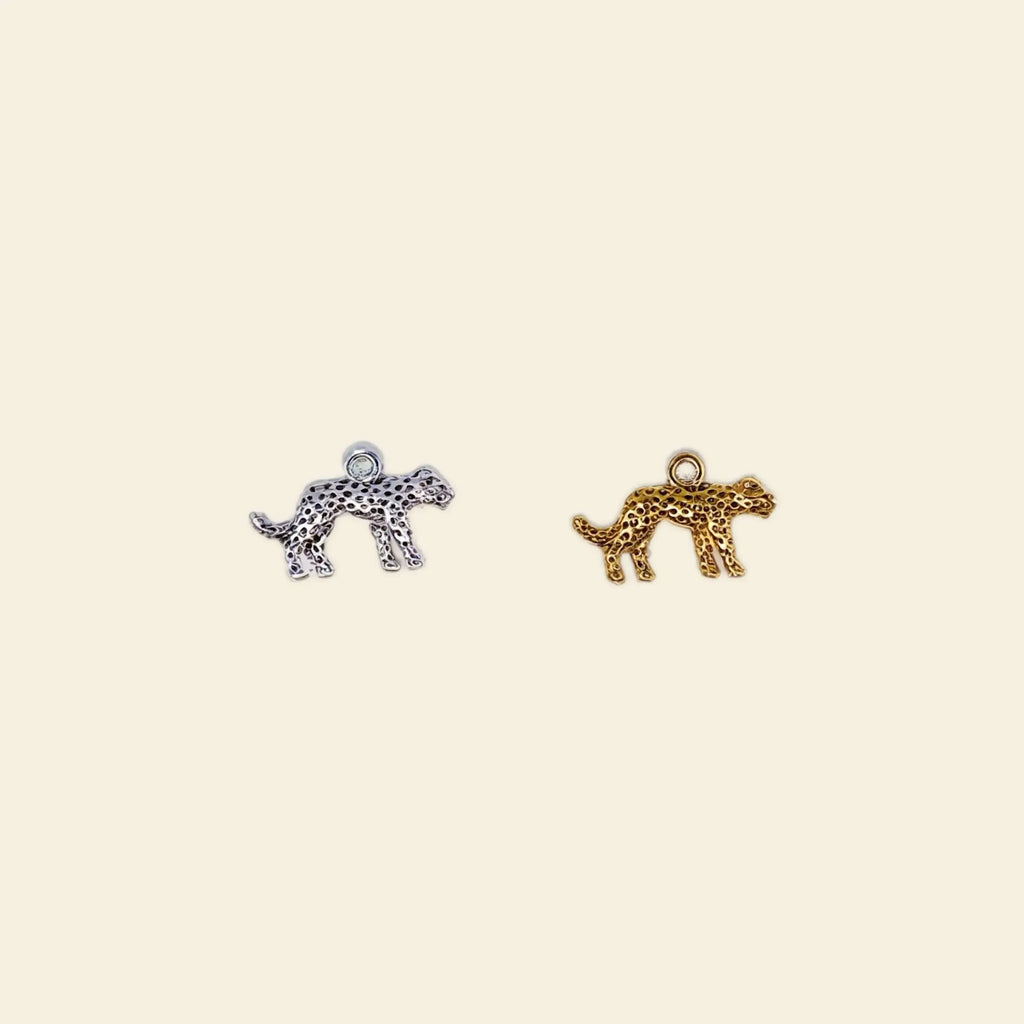custom phone case accessories: gold and silver leopard charms for phone cases.