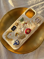 Made-to-order iPhone phone case with charms, handmade small luxury tech accessory, perfect self-gift or treat under £40.