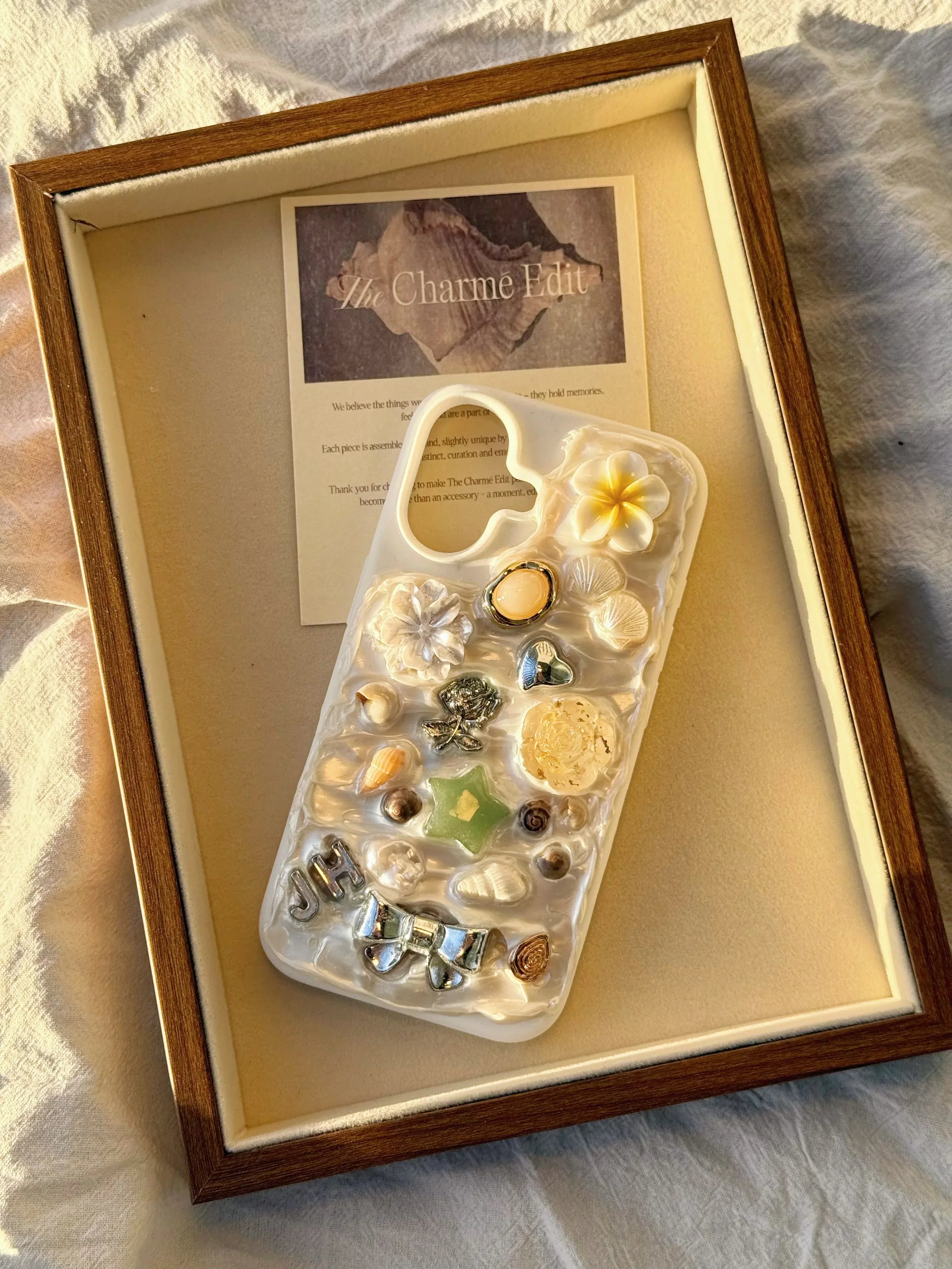 White silicone custom charm phone case for iPhone, handcrafted and made to order, aesthetic gift idea for her birthday or Christmas.