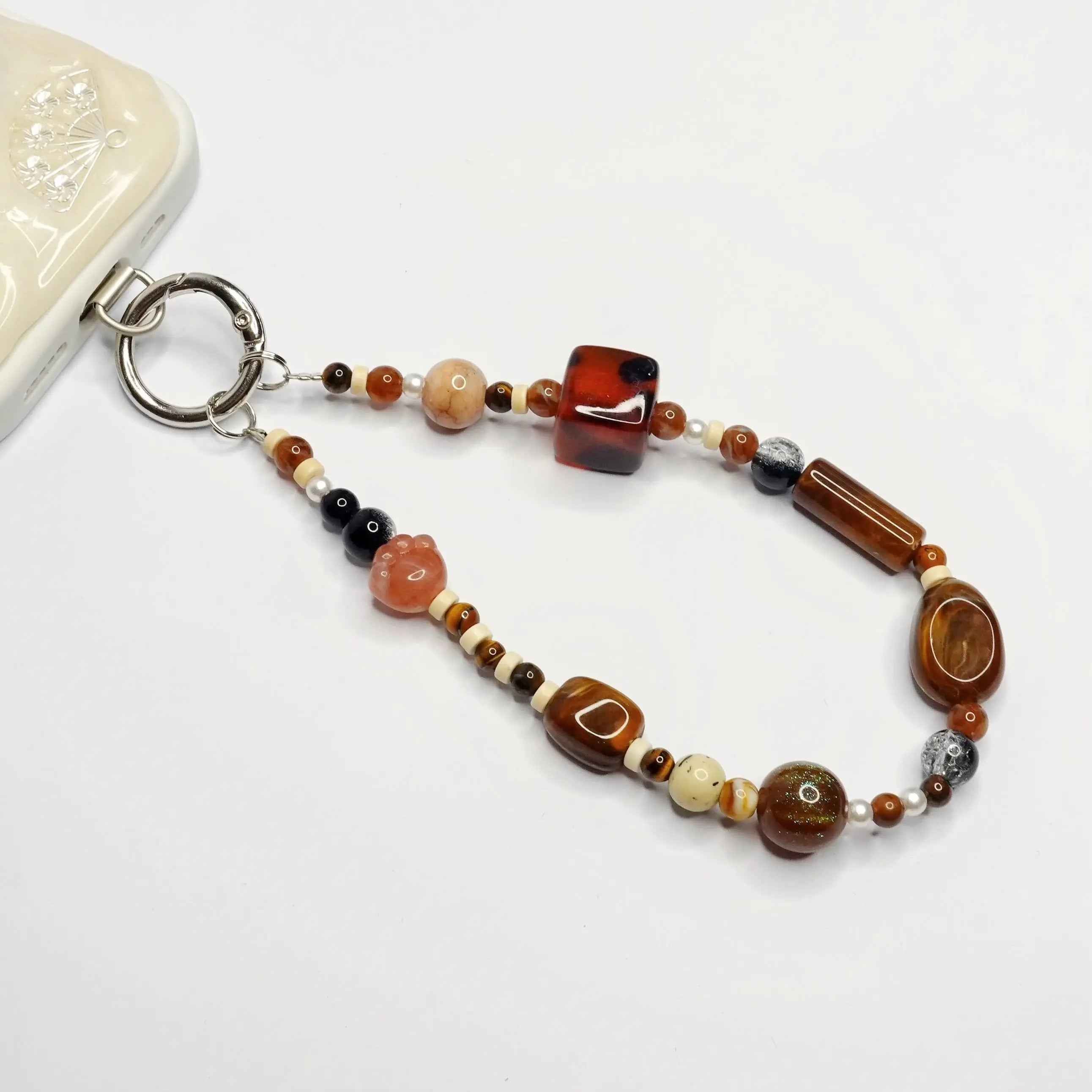 Caramel aura phone strap
