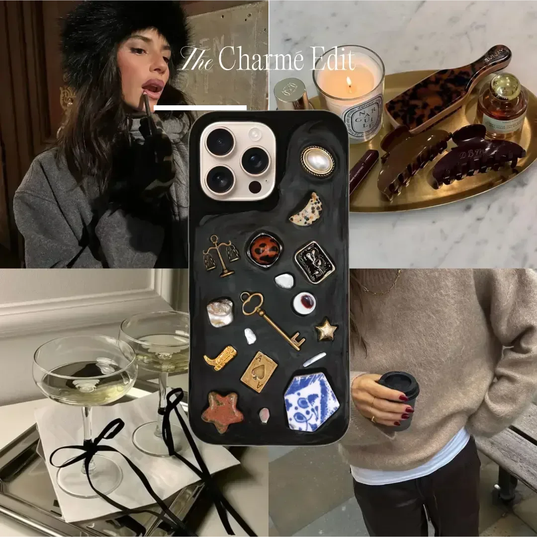 Dark aesthetic custom phone with gold key, skull, and heart charms.