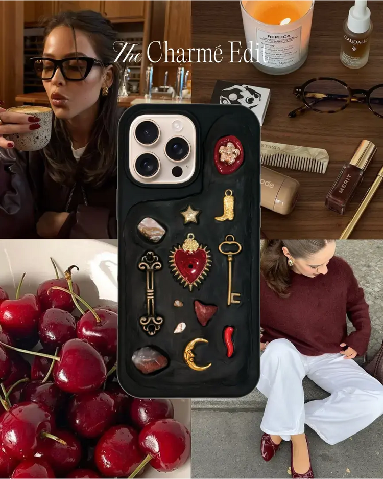 Luxury black iphone customized cover with gold heart, moon, and burgundy charms.