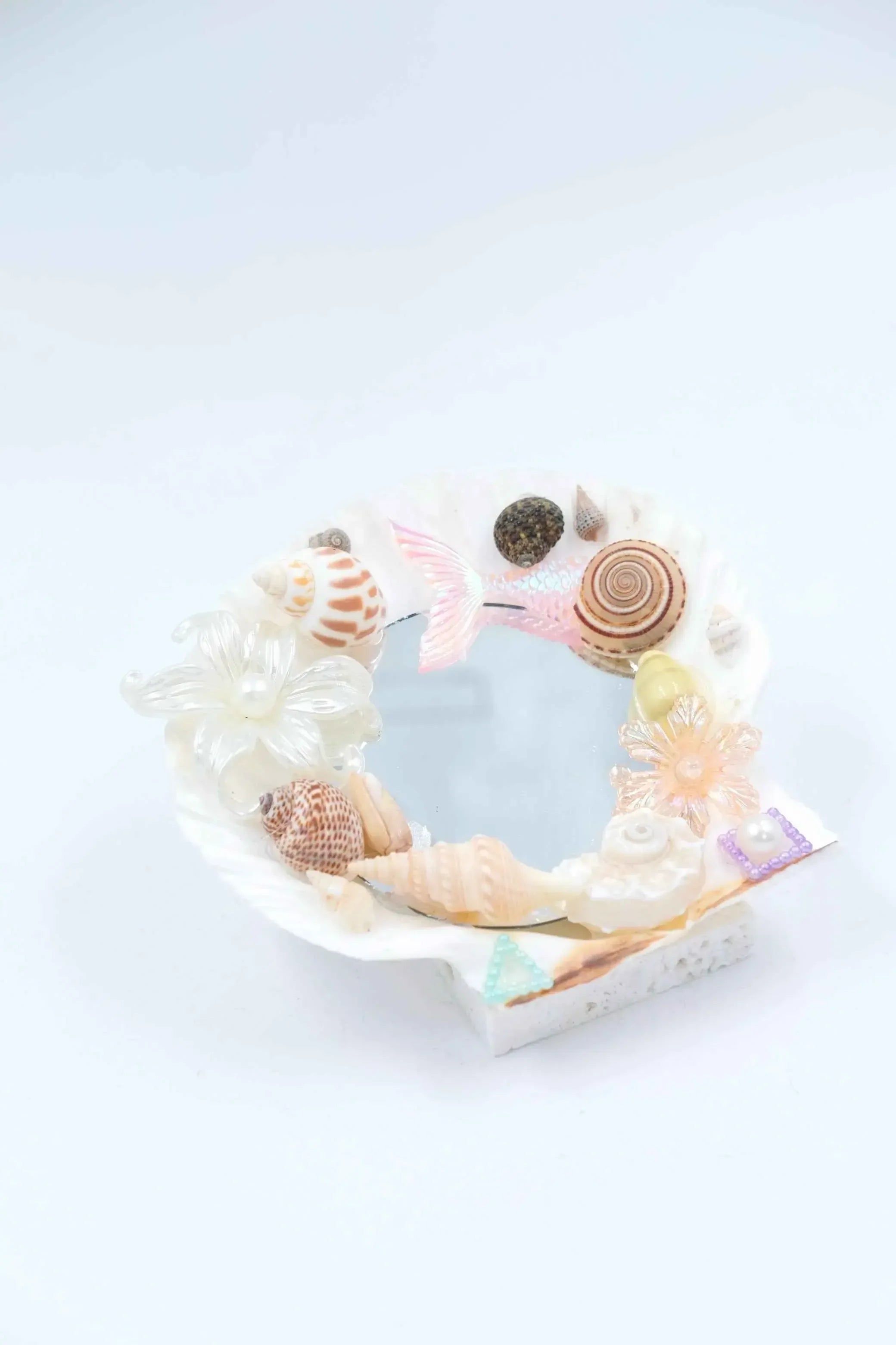 gift coquette room decor: handmade seashell mirror with blue mermaid tail charms.