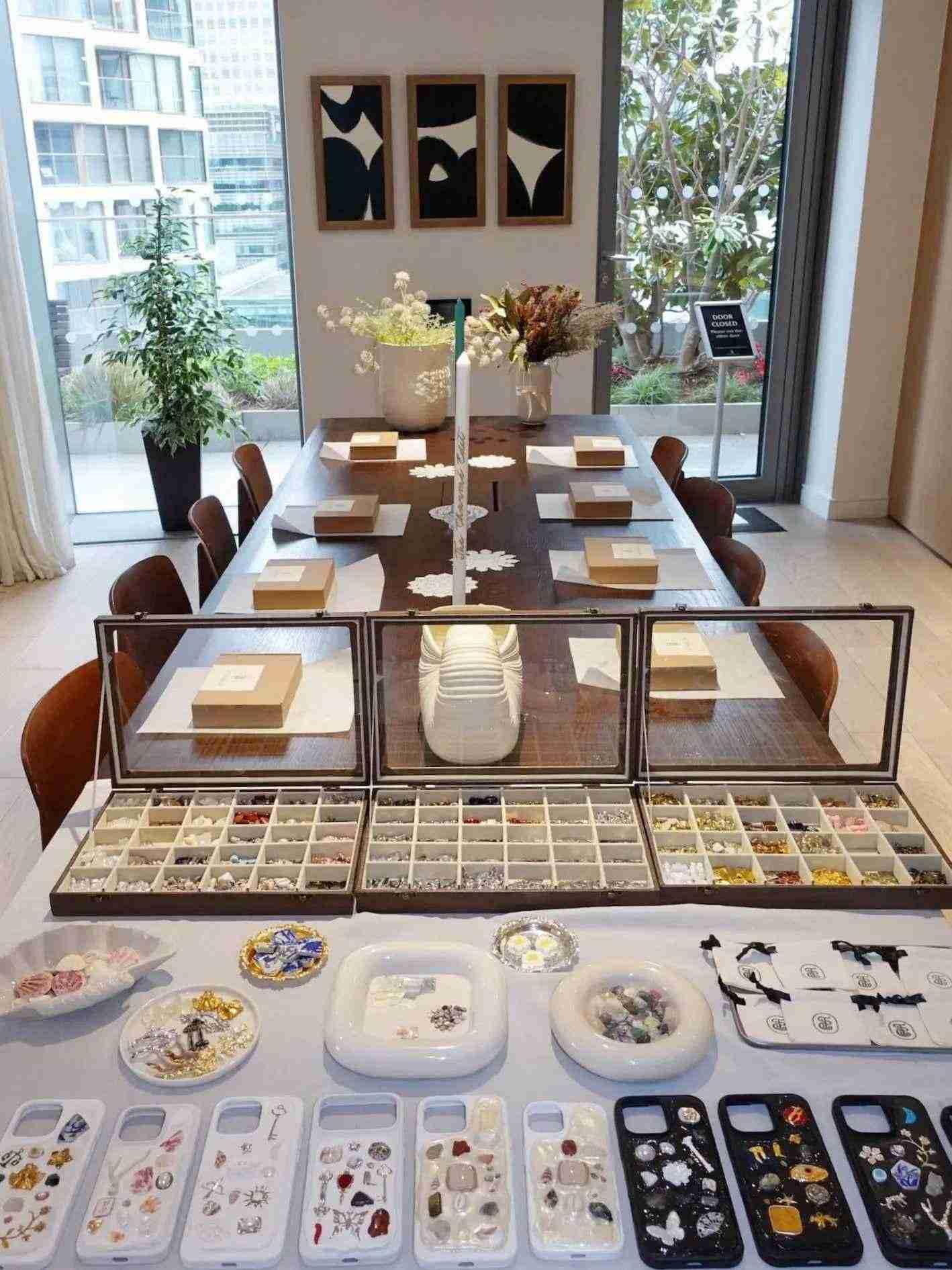 Corporate team bonding charm workshop in London, creative phone case and photo frame making experience for office socials and brand events.