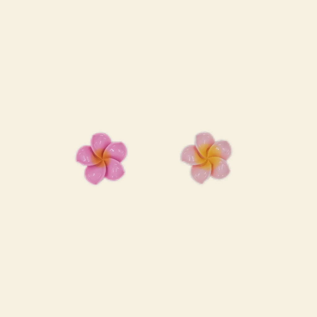 aesthetic phone charms: pink hibiscus flower charms for phone cases.