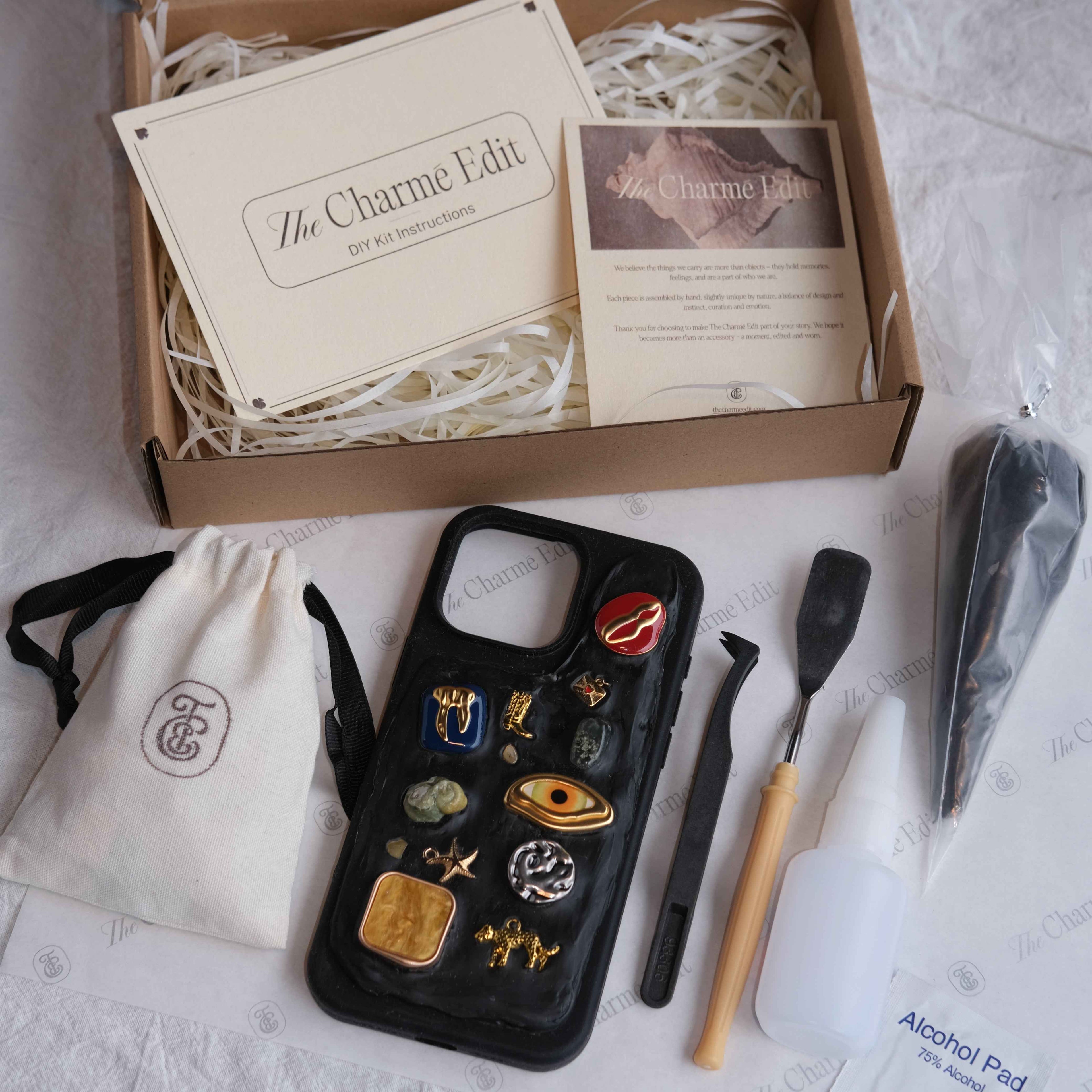 The Charme Edit DIY phone case kit with charms, seashells, tools, and materials to create a handmade custom iPhone case. Perfect for birthdays, creative gifts, craft parties, or a relaxing self-care project. | Craft ideas, custom phone cases, DIY phone cases