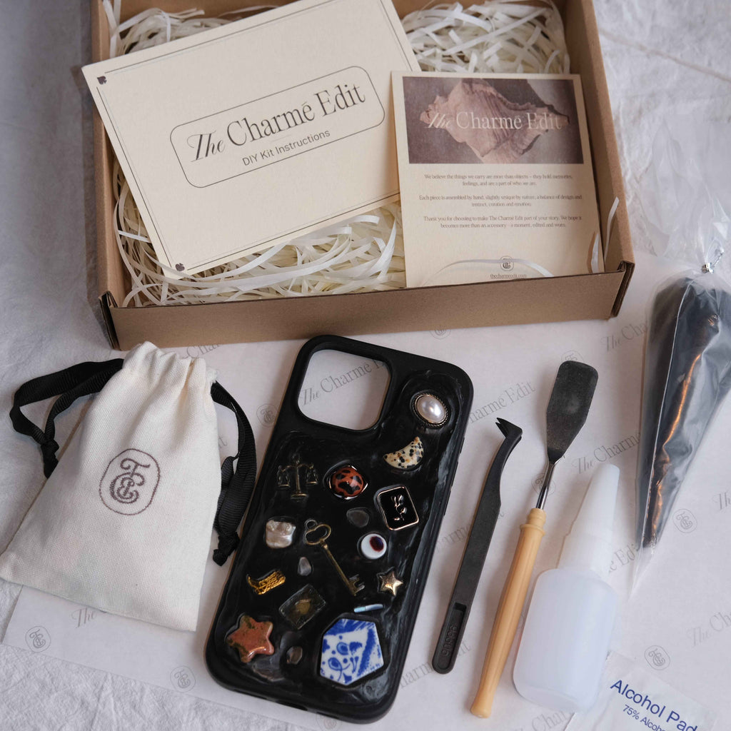 The Charme Edit DIY phone case kit with charms, seashells, tools, and materials to create a custom handmade iPhone case. Perfect for birthdays, creative gifts, craft parties, or a relaxing self-care project.