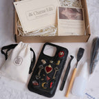 The Charme Edit DIY phone case kit with charms, seashells, tools, and materials to create a handmade custom iPhone case. Perfect for birthdays, creative gifts, craft parties, or a relaxing self-care project. | Craft ideas, custom phone cases, DIY phone cases