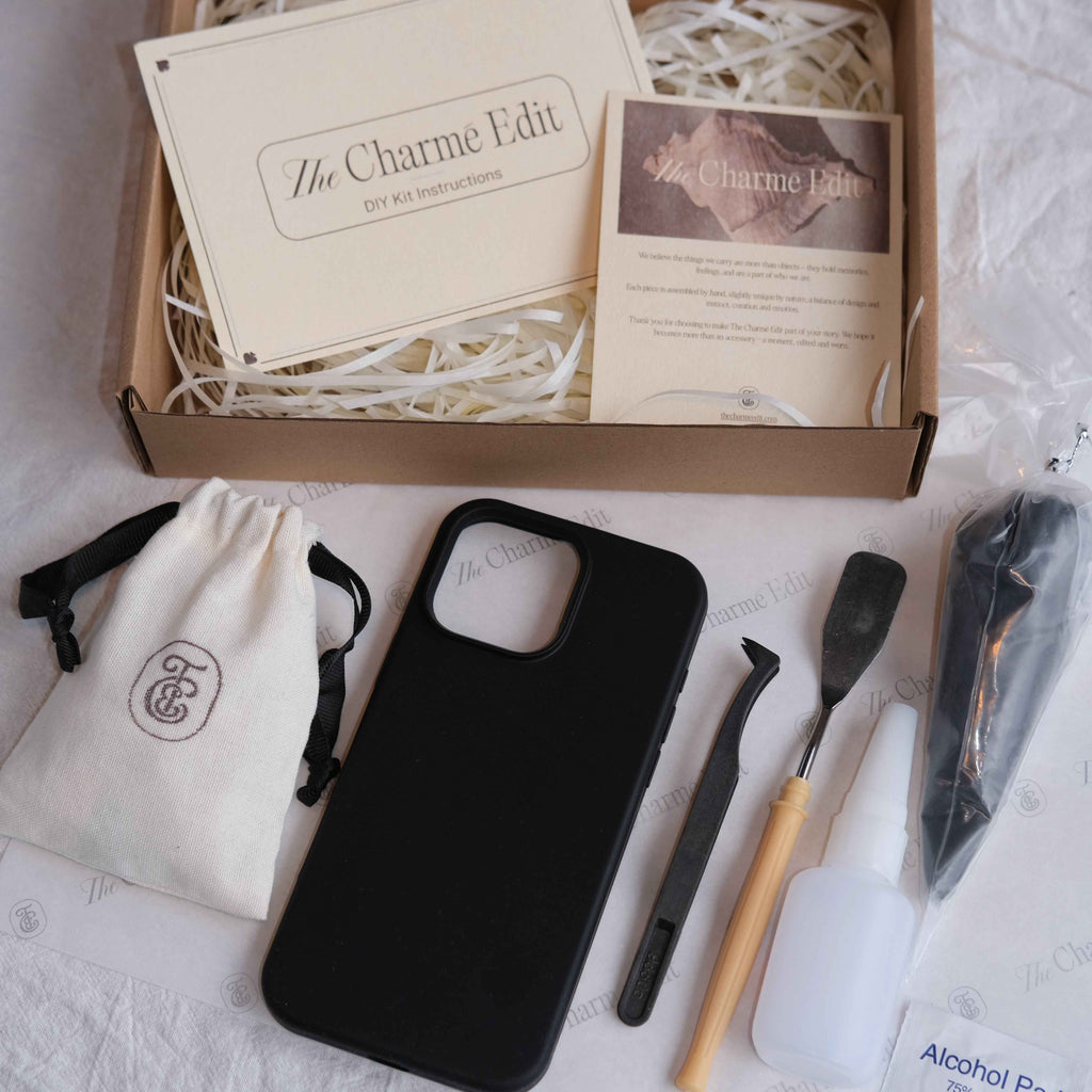 The Charme Edit DIY phone case kit with charms, seashells, tools, and materials to create a handmade custom iPhone case. Perfect for birthdays, creative gifts, craft parties, or a relaxing self-care project. | Craft ideas, custom phone cases, DIY phone cases.
