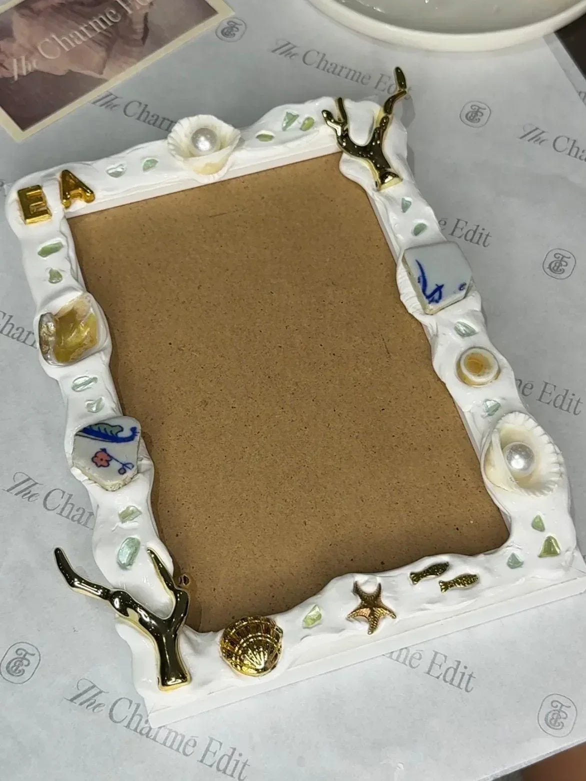 bespoke charm photo frame with personalised layout and decorative charms