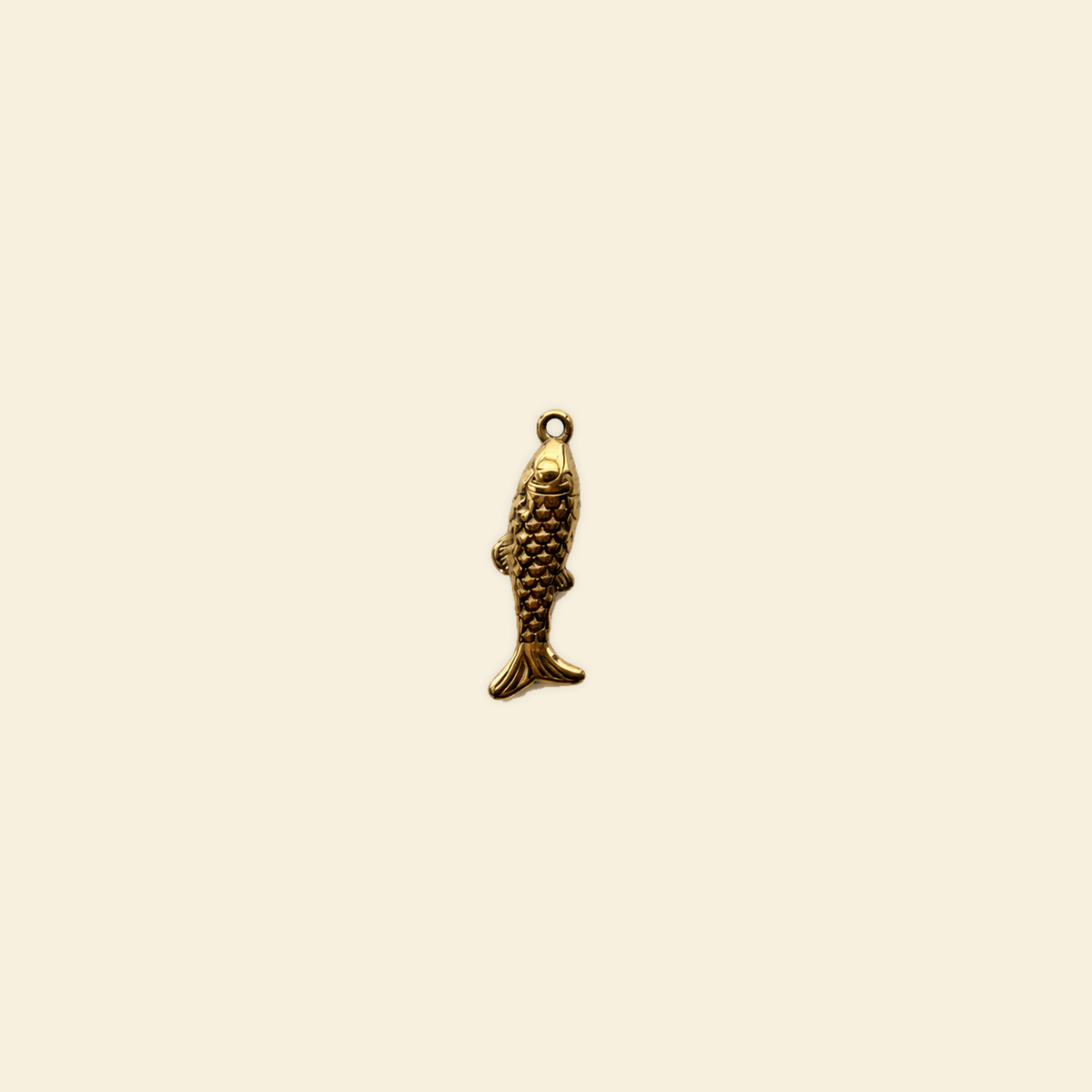 koi charm on a solid #f7f0df background