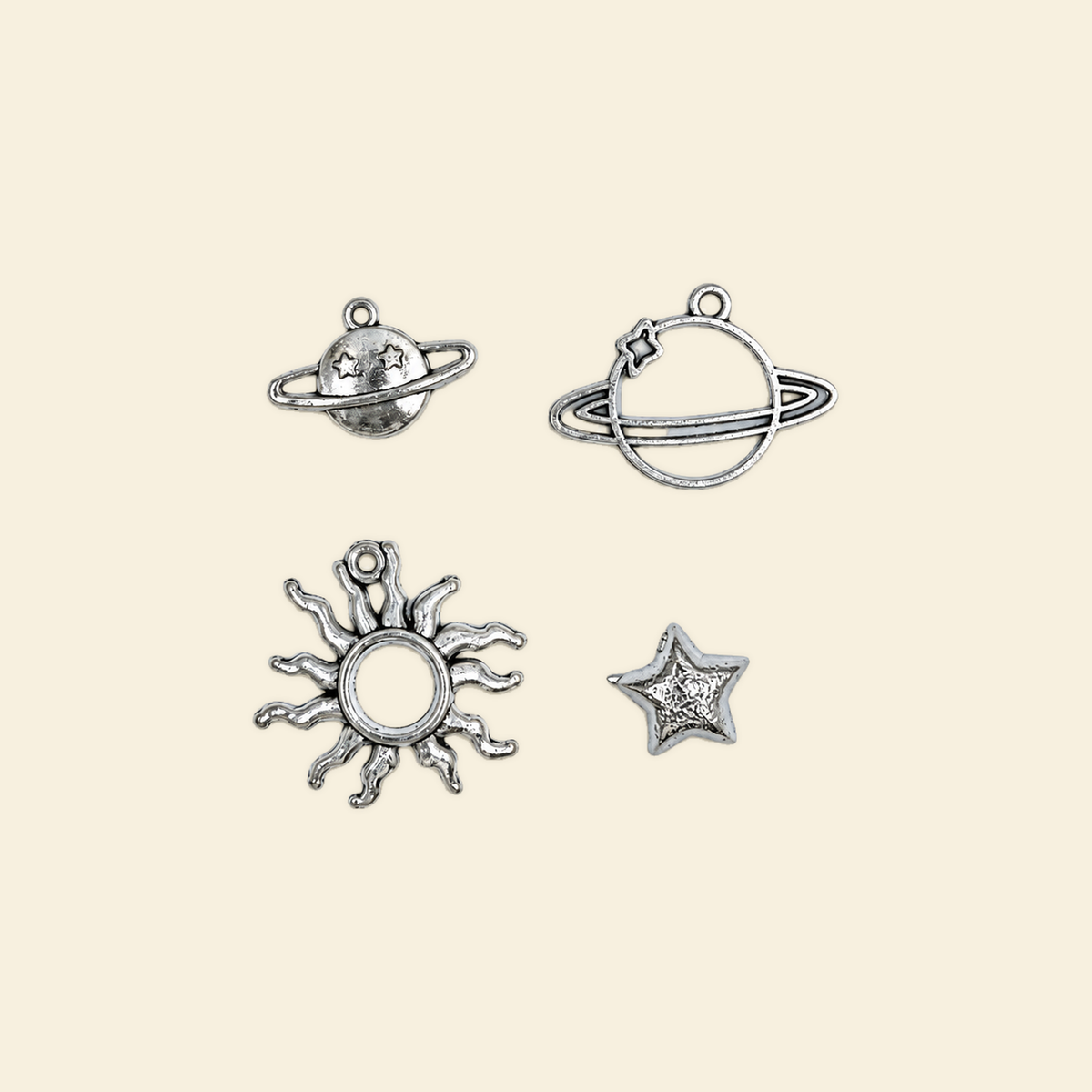 My Universe - Midi / Grande Charm, four silver celestial charms on solid #f7f0df