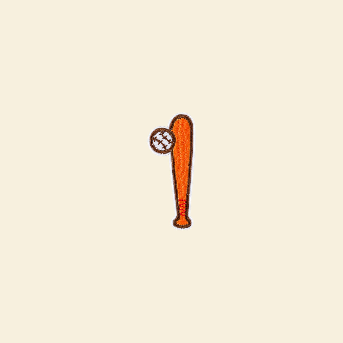Orange baseball bat and ball iron-on patch for a custom tote bag