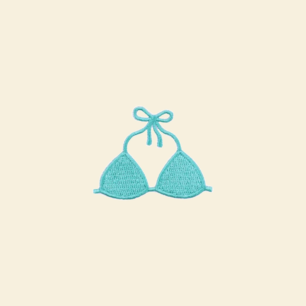 Turquoise bikini top iron-on patch for a custom tote bag