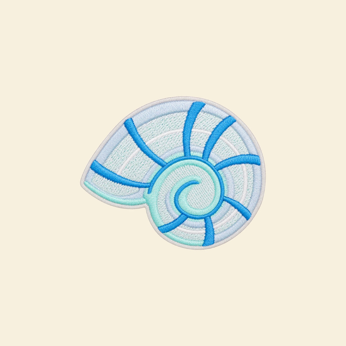Pale blue spiral seashell embroidered tote bag patch