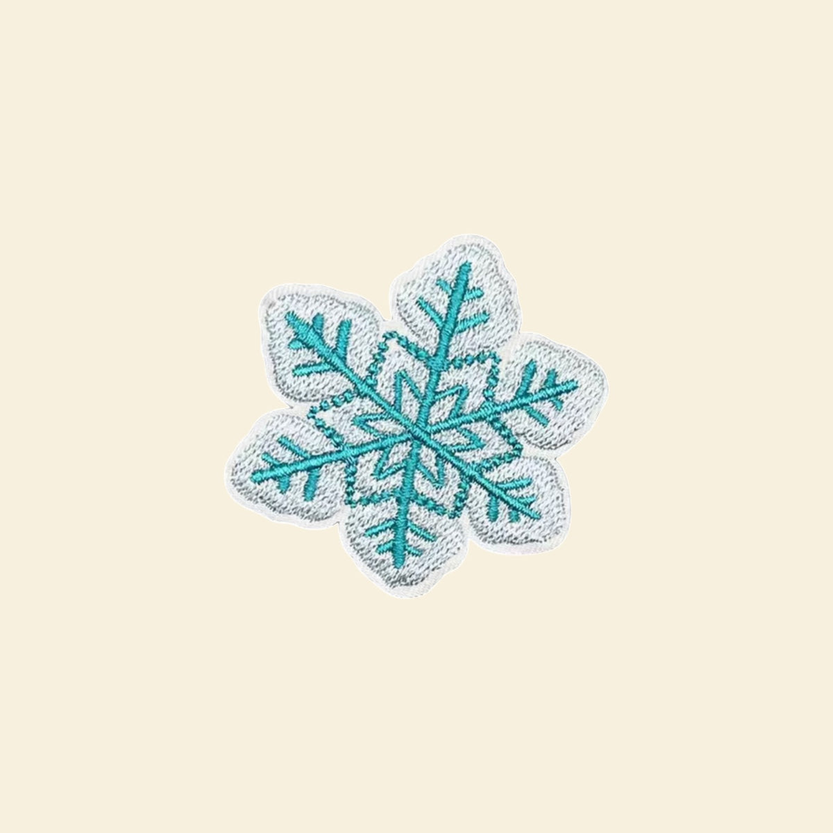 Teal and white snowflake embroidered tote bag patch