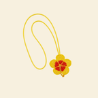 The Soleil Bloom hand-beaded flower bag charm